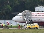 Security personnel conduct inspection of an Air India aircraft after it received a bomb threat, in Thiruvananthapuram, Thursday. (PTI) Security personnel conduct inspection of an Air India aircraft after it received a bomb threat, in Thiruvananthapuram, Thursday. (PTI)