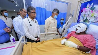 Andhra Pradesh Chief Minister N Chandrababu Naidu meets an injured victim of the Achyutapuram Pharma Company accident at Visakha Hospital, in Anakapalli on Thursday. (PTI) Andhra Pradesh Chief Minister N Chandrababu Naidu meets an injured victim of the Achyutapuram Pharma Company accident at Visakha Hospital, in Anakapalli on Thursday. (PTI)