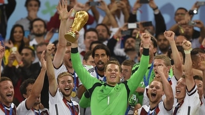 Germany's goalkeeper Manuel Neuer (front C) and team-mates celebrate with the 2014 World Cup trophy. (AFP) Germany's goalkeeper Manuel Neuer (front C) and team-mates celebrate with the 2014 World Cup trophy. (AFP)