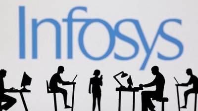Figurines with computers and smartphones are seen in front of Infosys logo in this illustration. (Reuters)