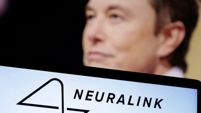 The Neuralink logo and Elon Musk's photo are seen in this illustration taken, December 19, 2022. (Dado Ruvic/Reuters)