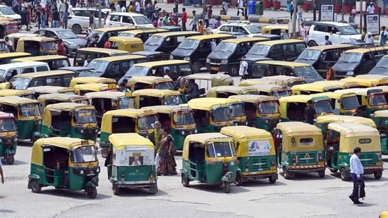Taxis and autorickshaws stand parked outside the New Delhi Railway Station on Thursday. (Sanjeev Verma/HT Photo)