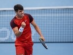 Carlos Alcaraz of Spain reacts to a point.