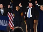 Democratic presidential nominee and U.S. Vice President Kamala Harris, her husband Doug Emhoff, Democratic vice presidential nominee Minnesota Governor Tim Walz, and his wife Gwen stand onstage on Day 4 of the Democratic National Convention (DNC) at the United Center in Chicago, Illinois, U.S., August 22, 2024. REUTERS/Callaghan O'hare