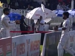Mohammad Rizwan (R) throws bat towards Babar Azam during 1st Test Mohammad Rizwan (R) throws bat towards Babar Azam during 1st Test