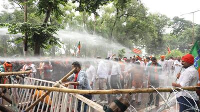 BJP workers and police clash during a protest near Morhabadi ground in Ranchi on Friday. (HT Photo)