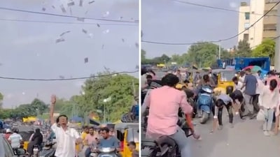 A YouTuber was seen tossing cash on busy Hyderabad roads. A YouTuber was seen tossing cash on busy Hyderabad roads.