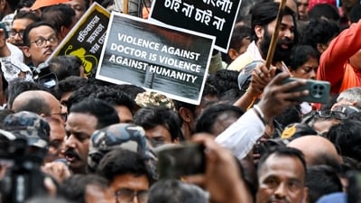 Kolkata rape and murder: Bharatiya Janata Party (BJP) activists protest in Kolkata on August 22, 2024, to condemn the rape and murder of a doctor in RG Kar Medical College and Hospital. (AFP) Kolkata rape and murder: Bharatiya Janata Party (BJP) activists protest in Kolkata on August 22, 2024, to condemn the rape and murder of a doctor in RG Kar Medical College and Hospital. (AFP)