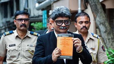 Mumbai, Aug 23 (ANI): Advocate Gunratan Sadavarte holds a copy of 'The Constitute of India' after Bombay High Court said that it will restrain any political party or individuals from proceeding on call of Maharashtra Bandh on August 24, in Mumbai on Friday. (ANI Photo) (Deepak Salvi) Mumbai, Aug 23 (ANI): Advocate Gunratan Sadavarte holds a copy of 'The Constitute of India' after Bombay High Court said that it will restrain any political party or individuals from proceeding on call of Maharashtra Bandh on August 24, in Mumbai on Friday. (ANI Photo) (Deepak Salvi)