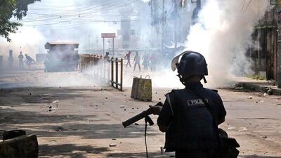 Police use tear gas to disperse student protestors in Bogura, Bangladesh on August 4. (AFP)