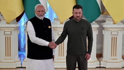 Prime Minister Narendra Modi and Ukrainian President Volodymyr Zelensky shake hands prior to their talks at the Mariinskyi Palace. (AFP)