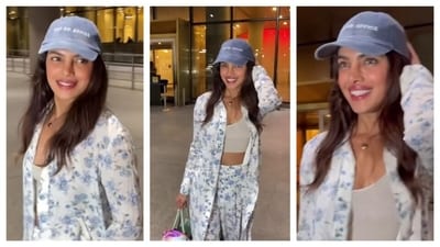 Priyanka Chopra wore a classy, floral printed blue and white cord set. With a grey bralette underneath, she gave the simple co-ord set a fun twist. Carrying a green bag and sporting a baseball cap, her outfit radiated a casual and relaxed aesthetic, perfect for lazy outings with friends. (Instagram/@varindertchawla) Priyanka Chopra wore a classy, floral printed blue and white cord set. With a grey bralette underneath, she gave the simple co-ord set a fun twist. Carrying a green bag and sporting a baseball cap, her outfit radiated a casual and relaxed aesthetic, perfect for lazy outings with friends. (Instagram/@varindertchawla)