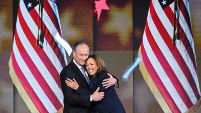 At DNC, Kamala Harris hugs Second Gentleman Douglas Emhoff after speaking on the fourth and last day of the event at the United Center in Chicago, Illinois, on August 22, 2024. (AFP) At DNC, Kamala Harris hugs Second Gentleman Douglas Emhoff after speaking on the fourth and last day of the event at the United Center in Chicago, Illinois, on August 22, 2024. (AFP)