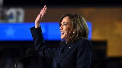 Kamala Harris gestures after speaking on the fourth and last day of the Democratic National Convention (DNC) at the United Center in Chicago, Illinois, on August 22, 2024. She blasted her rival Donald Trump for endorsing dictators like Vladimir Putin and Kim Jong Un. (AFP) Kamala Harris gestures after speaking on the fourth and last day of the Democratic National Convention (DNC) at the United Center in Chicago, Illinois, on August 22, 2024. She blasted her rival Donald Trump for endorsing dictators like Vladimir Putin and Kim Jong Un. (AFP)