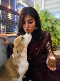 Harshita Malhotra with her beagle. Harshita Malhotra with her beagle.