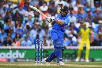 Shikhar Dhawan pulls for six with a broken thumb. (Getty) Shikhar Dhawan pulls for six with a broken thumb. (Getty)