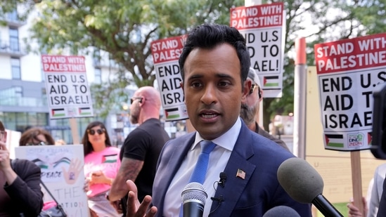 Former Republican presidential candidate and entrepreneur Vivek Ramaswamy talks to the media at demonstration near the Democratic National Convention Thursday, Aug. 22, 2024, in Chicago. (AP Photo/Alex Brandon) (AP)