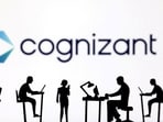 Figurines with computers and smartphones are seen in front of Cognizant's logo in this illustration taken (Reuters)