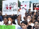 Doctors and medical students during a candlelight protest in Bengaluru.