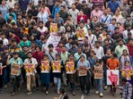 Kolkata: Doctors raise slogans during a protest rally over the recent alleged rape and murder of a trainee doctor at the RG Kar Medical College and Hospital, in Kolkata, Wednesday, Aug. 21, 2024. Kolkata: Doctors raise slogans during a protest rally over the recent alleged rape and murder of a trainee doctor at the RG Kar Medical College and Hospital, in Kolkata, Wednesday, Aug. 21, 2024.