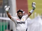 Pakistan's Mohammad Rizwan celebrates after scoring century. Pakistan's Mohammad Rizwan celebrates after scoring century.