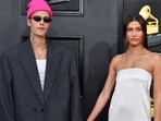 (FILES)  Justin Bieber (L) and Hailey Bieber arrive for the 64th Annual Grammy Awards (Photo by ANGELA  WEISS / AFP)