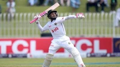 Bangladesh's Mushfiqur Rahim celebrates after scoring century during the fourth day of first cricket test match between Pakistan and Bangladesh, in Rawalpindi, Pakistan, Saturday (AP)