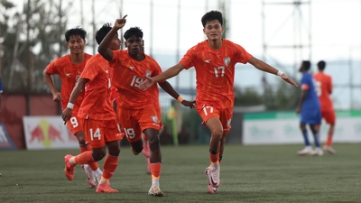 Manglenthang Kipgen celebrates his goal.