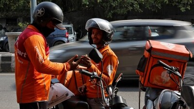 Gig workers prepare to deliver orders outside Swiggy's grocery warehouse at a market area in New Delhi, India, May 6, 2024. (Priyanshu Singh/Reuters) Gig workers prepare to deliver orders outside Swiggy's grocery warehouse at a market area in New Delhi, India, May 6, 2024. (Priyanshu Singh/Reuters)