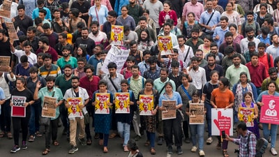 Kolkata: Doctors raise slogans during a protest rally over the recent alleged rape and murder of a trainee doctor at the RG Kar Medical College and Hospital, in Kolkata, Wednesday, Aug. 21, 2024. (PTI) Kolkata: Doctors raise slogans during a protest rally over the recent alleged rape and murder of a trainee doctor at the RG Kar Medical College and Hospital, in Kolkata, Wednesday, Aug. 21, 2024. (PTI)