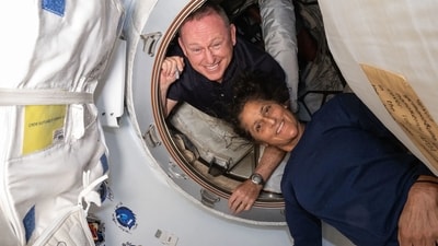 Barry 'Butch' Wilmore and Sunita Williams inside the vestibule between the forward port on the International Space Station's Harmony module and Boeing's Starliner spacecraft. (AFP) Barry 'Butch' Wilmore and Sunita Williams inside the vestibule between the forward port on the International Space Station's Harmony module and Boeing's Starliner spacecraft. (AFP)