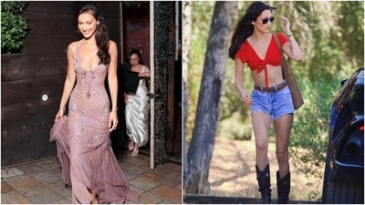 Bella Hadid won the internet with two different aesthetics- cowboy chic and full-on glam goddess. During the day, she arrived on a shoot dressed in a vibrant red tied crop top and cut-off denim shorts styled with boots and a Coach suede bag. At night, she changed into a Zuhair Murad lilac embellished gown to attend the launch party for her newest Orebella fragrance. (Instagram) Bella Hadid won the internet with two different aesthetics- cowboy chic and full-on glam goddess. During the day, she arrived on a shoot dressed in a vibrant red tied crop top and cut-off denim shorts styled with boots and a Coach suede bag. At night, she changed into a Zuhair Murad lilac embellished gown to attend the launch party for her newest Orebella fragrance. (Instagram)