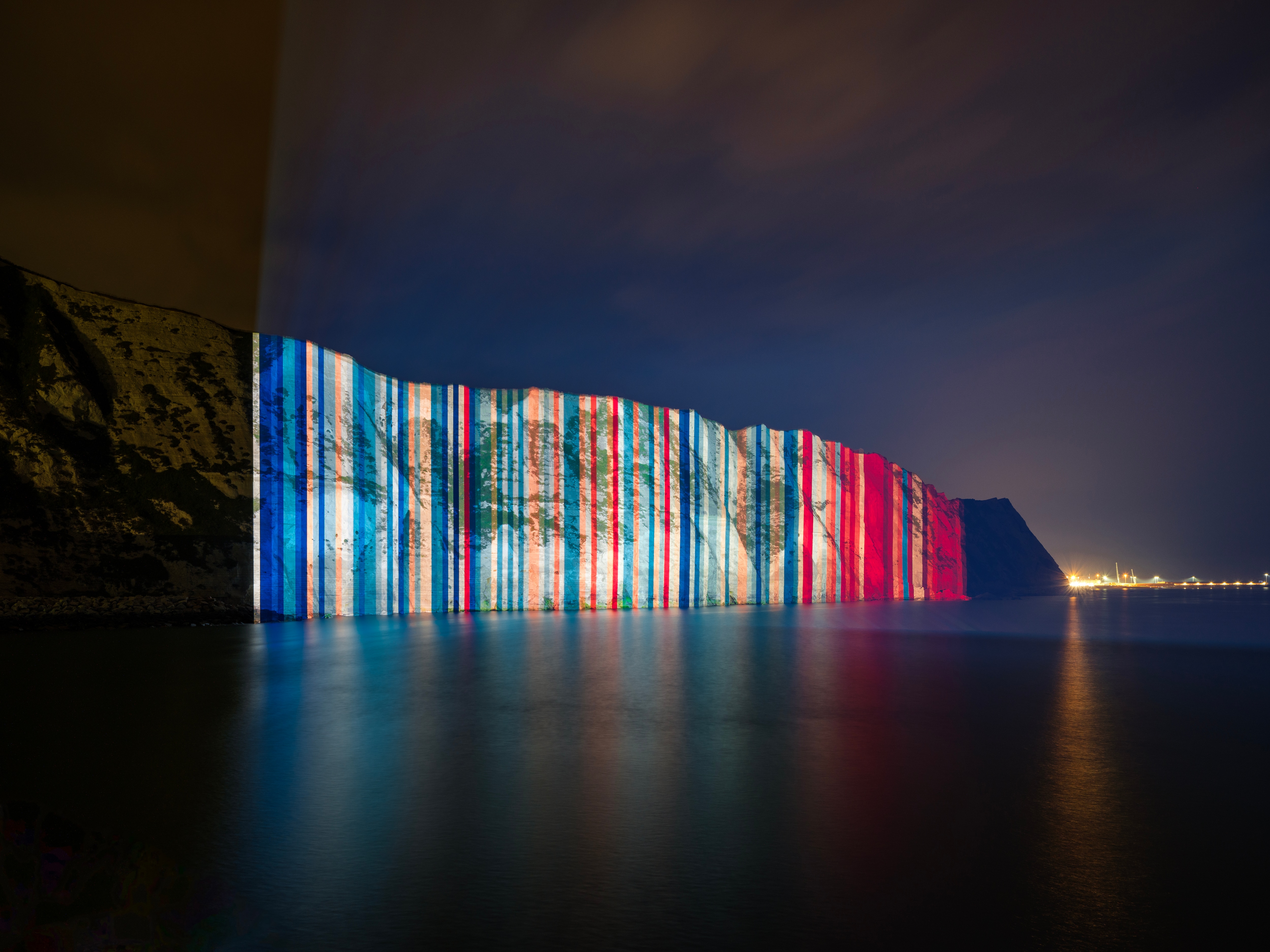 The stripes for UK are projected onto the White Cliffs of Dover. (Courtesy University of Reading) The stripes for UK are projected onto the White Cliffs of Dover. (Courtesy University of Reading)