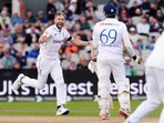 England's Chris Woakes, left, celebrates taking the wicket of Sri Lanka's Angelo Mathews on day three of the First Test match between England and Sri Lanka England's Chris Woakes, left, celebrates taking the wicket of Sri Lanka's Angelo Mathews on day three of the First Test match between England and Sri Lanka