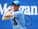 Jannik Sinner of Italy returns the ball during a practice session. Jannik Sinner of Italy returns the ball during a practice session.