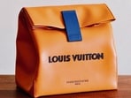 The Louis Vuitton staff counted  <span class='webrupee'>₹</span>70 lakh in cash and later the customer decided to leave the store.