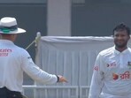 The umpire reprimands Shakib Al Hasan after he throws the ball towards Mohammad Rizwan The umpire reprimands Shakib Al Hasan after he throws the ball towards Mohammad Rizwan