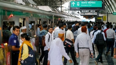 Passengers arrive at a metro train station in Dhaka on August 25, 2024. Bangladesh's metro railine in the notoriously congested capital Dhaka resumed on August 25, more than a month after it was closed during peak of student-led protests that eventually toppled the government. (Photo by Rahman ASAD / AFP) Passengers arrive at a metro train station in Dhaka on August 25, 2024. Bangladesh's metro railine in the notoriously congested capital Dhaka resumed on August 25, more than a month after it was closed during peak of student-led protests that eventually toppled the government. (Photo by Rahman ASAD / AFP)