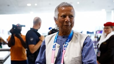 Nobel laureate Muhammad Yunus, stands at Paris Charles de Gaulle airport in Roissy-en-France, France August 7, 2024.