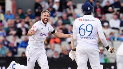 England's Chris Woakes, left, celebrates taking the wicket of Sri Lanka's Angelo Mathews on day three of the First Test match between England and Sri Lanka (AP) England's Chris Woakes, left, celebrates taking the wicket of Sri Lanka's Angelo Mathews on day three of the First Test match between England and Sri Lanka (AP)
