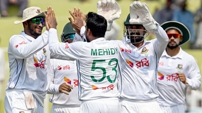 Bangladesh's Mehidy Hasan Miraz (C) celebrates with teammates after taking the wicket of Pakistan's Mohammad Rizwan (not pictured) during the fifth and final day of the first Test cricket match (AFP) Bangladesh's Mehidy Hasan Miraz (C) celebrates with teammates after taking the wicket of Pakistan's Mohammad Rizwan (not pictured) during the fifth and final day of the first Test cricket match (AFP)
