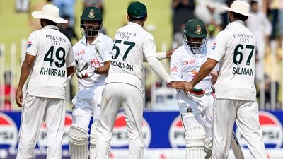 Bangladesh's Shadman Islam (2L) and Zakir Hasan (2R) shake hands with Pakistan's players after their team's win at the end of the fifth and final day of the first Test cricket match. (AFP) Bangladesh's Shadman Islam (2L) and Zakir Hasan (2R) shake hands with Pakistan's players after their team's win at the end of the fifth and final day of the first Test cricket match. (AFP)