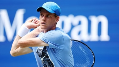 Jannik Sinner of Italy returns the ball during a practice session. (Getty Images via AFP)
