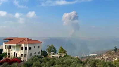 Smoke billows from an area targeted by an Israeli airstrike in the southern Lebanese village of Qsair on August 25, 2024. (AFP) Smoke billows from an area targeted by an Israeli airstrike in the southern Lebanese village of Qsair on August 25, 2024. (AFP)