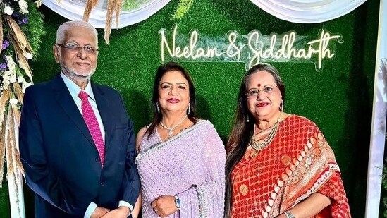 ,Madhu Chopra poses with a picture with some family friends. Priyanka recently wrapped the shoot of her upcoming project The Bluff.