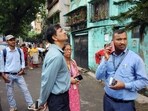 CBI officers outside the residence of former RG Kar Medical College principal Sandip Ghosh in Kolkata on August 25. CBI officers outside the residence of former RG Kar Medical College principal Sandip Ghosh in Kolkata on August 25.
