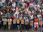 Kolkata: Doctors raise slogans during a protest rally over the recent alleged rape and murder of a trainee doctor at the RG Kar Medical College and Hospital, in Kolkata, Wednesday, Aug. 21, 2024.
