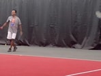 Vivek Ramaswamy and Andre Agassi attend tennis practice as partners. Vivek Ramaswamy and Andre Agassi attend tennis practice as partners.