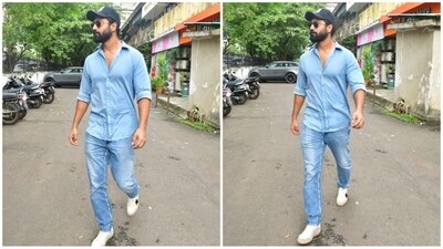 Vicky Kaushal kept it casual and dashing in a blue folded-sleeve shirt paired with denim jeans. He accessorised his look with white sneakers and a navy blue cap, completing the laid-back appearance. (HT photo/VarinderChawla) Vicky Kaushal kept it casual and dashing in a blue folded-sleeve shirt paired with denim jeans. He accessorised his look with white sneakers and a navy blue cap, completing the laid-back appearance. (HT photo/VarinderChawla)