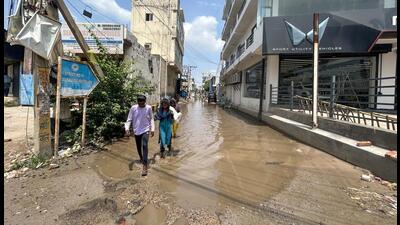 A waterlogged damaged street in Daultabad industrial in Gurugram on Monday. (Parveen Kumar/HT) A waterlogged damaged street in Daultabad industrial in Gurugram on Monday. (Parveen Kumar/HT)